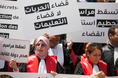Judges gather on the steps of the Palace of Justice during a protest against the Tunisian President Kais Saied in Tunis in June. AP
