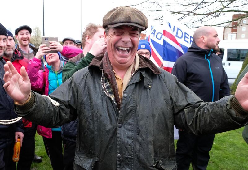 HARTLEPOOL, ENGLAND - MARCH 16: Nigel Farage reacts as he arrives at the end of the first leg of the March to Leave campaign on March 16, 2019 in Hartlepool, England. The first leg between Sunderland and Hartlepool marks the start of a journey over 14 stages with those marching expecting to arrive in London on March 29, the original date for the UK to leave the European Union. The march is organised by the Leave means Leave protest group and gives supporters an opportunity to demonstrate their discontent with the way they see Brexit has been handled. (Photo by Ian Forsyth/Getty Images)