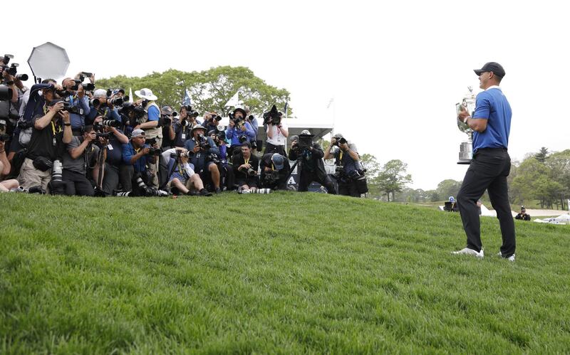 Brooks Koepka holds the Wanamaker Trophy after winning the 2019 PGA Championship at Bethpage Black. EPA