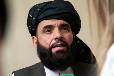 In this May 28, 2019, file photo, Suhail Shaheen, spokesman for the Taliban's political office in Doha, speaks to the media in Moscow, Russia. AP