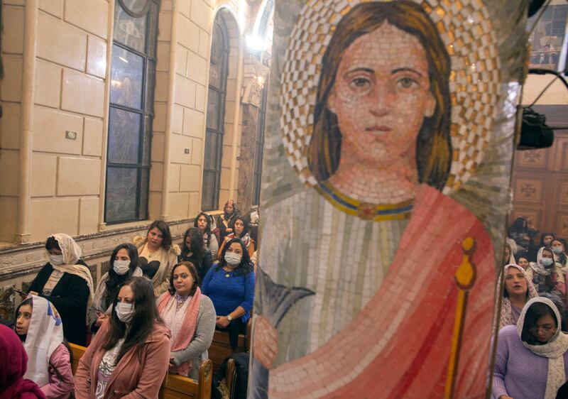 Worshippers attend Midnight Mass at the Church of St George. Christmas Mass begins around 8pm and ends at midnight, when worshippers go home to break a 43-day meat-free fast with traditional dishes. AP Photo