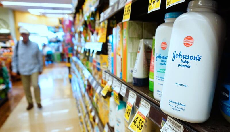 (FILES) In this file photo taken on August 22, 2017, Johnson's baby powder remains stocked at a supermarket shelf in Alhambra, California. US pharmaceutical and cosmetics group Johnson & Johnson saw its shares plunge on December 14, 2018, after a media report alleged the group had deliberately concealed for decades that its baby powder sometimes contained asbestos. A lengthy investigation by the Reuters news agency, which reviewed thousands of company documents, showed the company marketed talc-based products that, at least between 1971 and the beginning in the 2000s, sometimes contained asbestos. The company's executives, researchers, doctors and lawyers were aware but deliberately chose not to disclose this information and not to refer it to the authorities, according to the report. / AFP / FREDERIC J. BROWN
