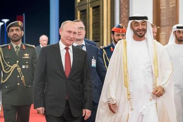 ABU DHABI, UNITED ARAB EMIRATES - October 15, 2019: HH Sheikh Mohamed bin Zayed Al Nahyan, Crown Prince of Abu Dhabi and Deputy Supreme Commander of the UAE Armed Forces (R) bids farewell to HE Vladimir Putin Vladimirovich, President of Russia (L), at the Presidential Airport. ( Rashed Al Mansoori / Ministry of Presidential Affairs ) ---