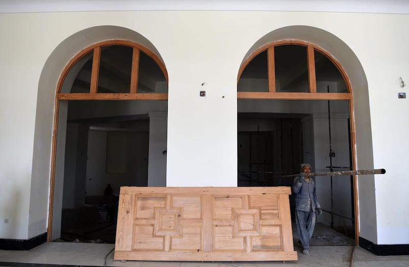 A new door stands ready to be fitted as part of the renovation work on Darulaman Palace. AFP