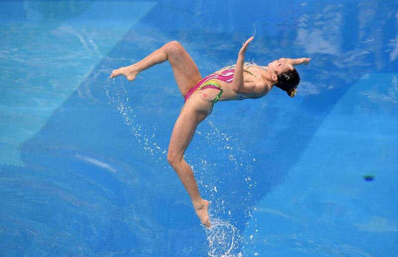 A North Korean swimmer competes in the team technical routine synchronised swimming event during the 2014 Asian Games. Philippe Lopez / AFP