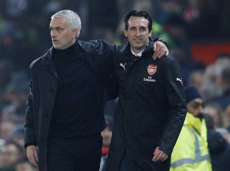 Manchester United manager Jose Mourinho with Arsenal manager Unai Emery after the match. Reuters