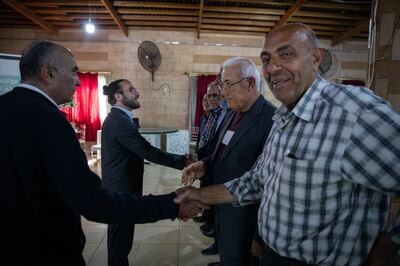 LEBANON: Saturday 16 April 2022 
Ali Khalifeh, Shiite opposition candidate for Al-Zahrani in Southern Lebanon, greets supporters in the restaurant hall in Sarafand where an opposition rally is being hosted.
Oliver Marsden