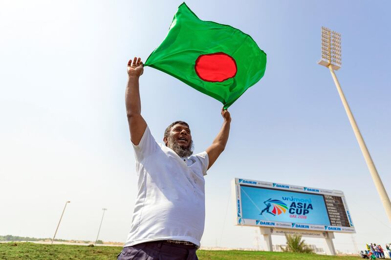 Abu Dhabi, United Arab Emirates - September 20, 2018: Bangladesh fans before the game between Bangladesh and Afghanistan in the Asia cup. Th, September 20th, 2018 at Zayed Cricket Stadium, Abu Dhabi. Chris Whiteoak / The National