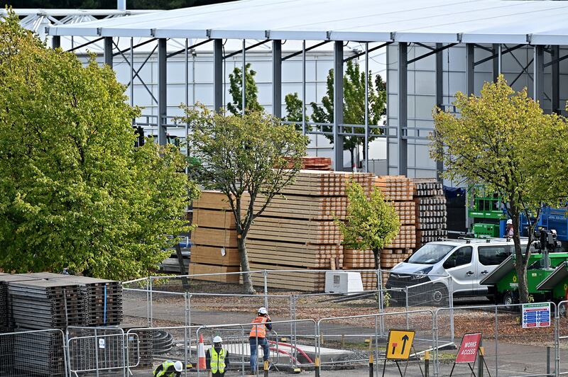 Construction workers prepare the site of the Cop26 climate summit in Glasgow, Scotland, where world leaders will gather for one of the biggest global meetings dedicated to tackling the climate crisis. Getty Images