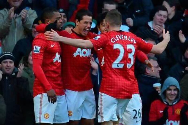 Manchester United’s Javier Hernandez, centre, can celebrate a league title with a win over Aston Villa at Old Trafford tonight. Andrew Yates / AFP