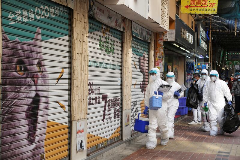 On Tuesday night, officials dressed in full PPE gear carried garbage bags marked with biohazard warnings out of the shop. Reuters