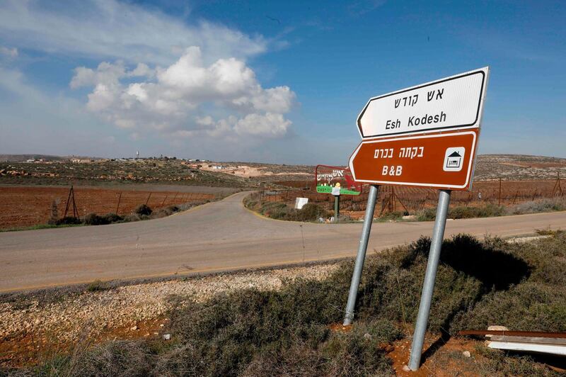 A road sign points towards an airbnb apartment, located in the Esh Kodesh outpost, near the Jewish settlement of Shilo and the Palestinian village of Qusra in the occupied West Bank on November 20, 2018.  Human Rights Watch urged Booking.com to follow the example of Airbnb and withdraw listings for rentals located in settlements in the Israeli-occupied West Bank.
Airbnb said earlier in the week that it will remove such listings, just ahead of the release of an HRW report criticising them.
 / AFP / afp / MENAHEM KAHANA
