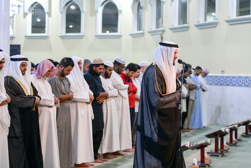 Imam Rashid Zobair leads early morning Ramadan prayer at the Bani Hashim Mosque in Abu Dhabi. Khushnum Bhandari / The National
