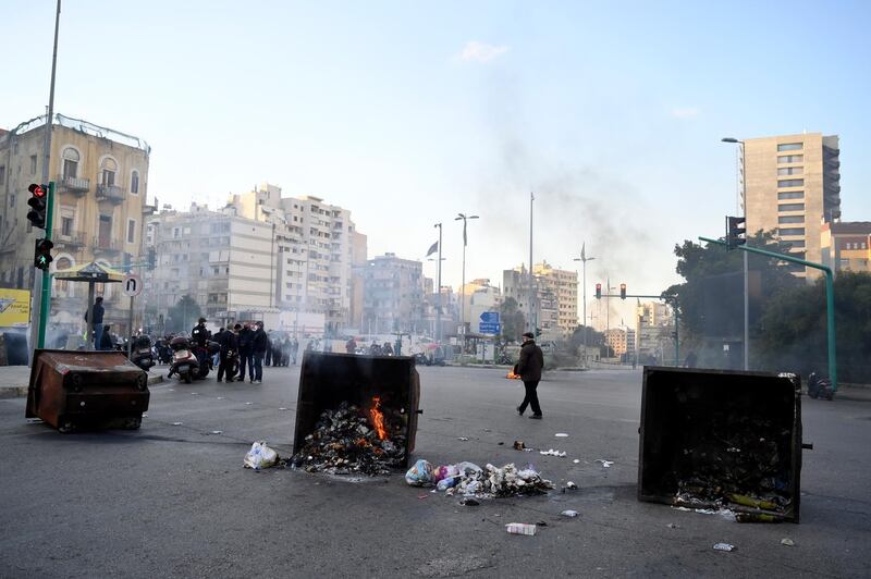 Protesters gather near a roadblock in Beirut, Lebanon, during a protest against power cuts. Last year, power cut protesters attempted to storm the Ministry of Energy. EPA