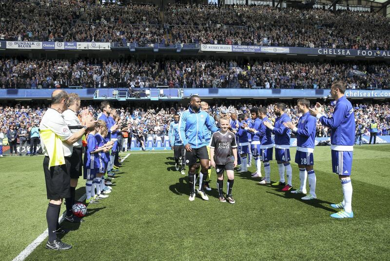 LONDON, ENGLAND - MAY 15 : Leicester City receive a guard of honour from Chelsea at Stamford Bridge ahead of the Premier League match between Chelsea and Leicester City at Stamford Bridge on May 15th, 2016 in London, United Kingdom.  (Photo by Plumb Images/Leicester City FC via Getty Images)