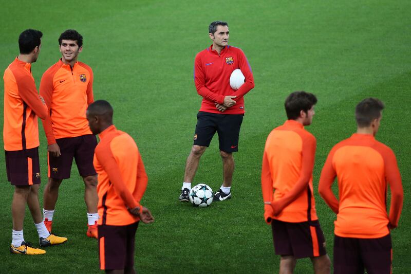 Barcelona manager Ernesto Valverde looks on during the training session. Petros Giannakouris / AP Photo