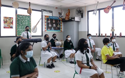Pupils at Delhi Private School in Jebel Ali practise for a cultural event. Khushnum Bhandari / The National

