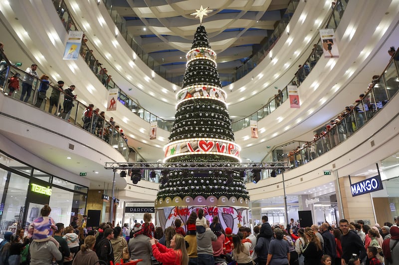 A Christmas tree towers inside a mall in Hazmieh, Lebanon. Reuters