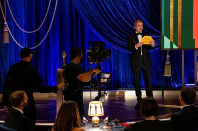 Brad Pitt presents the Oscar for Actress in a Supporting Roleduring the live ABC Telecast of The 93rd Oscars in Los Angeles, California, U.S., April 25, 2021. Todd Wawrychuk/A.M.P.A.S./Handout via REUTERS ATTENTION EDITORS. THIS IMAGE HAS BEEN SUPPLIED BY A THIRD PARTY. NO MARKETING OR ADVERTISING IS PERMITTED WITHOUT THE PRIOR CONSENT OF A.M.P.A.S AND MUST BE DISTRIBUTED AS SUCH. MANDATORY CREDIT. NO RESALES. NO ARCHIVES