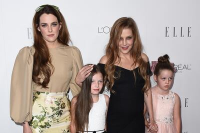 Lisa Marie Presley with her daughters Riley Keough and twin daughters Finley Lockwood and Harper Lockwood. Invision / AP