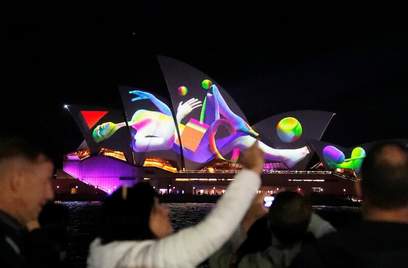 Crowds look at projections on the sails of the Sydney Opera House during the official start of Vivid Sydney, promoted as the world’s largest festival of light, music and ideas, in Sydney, Australia, May 25, 2018. The festival will run for 23 days. REUTERS / David Gray