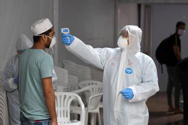 Volunteers can play their part in helping the UAE contain the spread of Covid-19. Courtesy: AFP