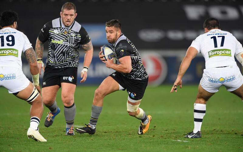 SWANSEA, WALES - OCTOBER 15:  Ospreys player Rhys Webb makes a break during the European Rugby Champions Cup match between Ospreys and ASM Clermont Auvergne at Liberty Stadium on October 15, 2017 in Swansea, Wales.  (Photo by Stu Forster/Getty Images)