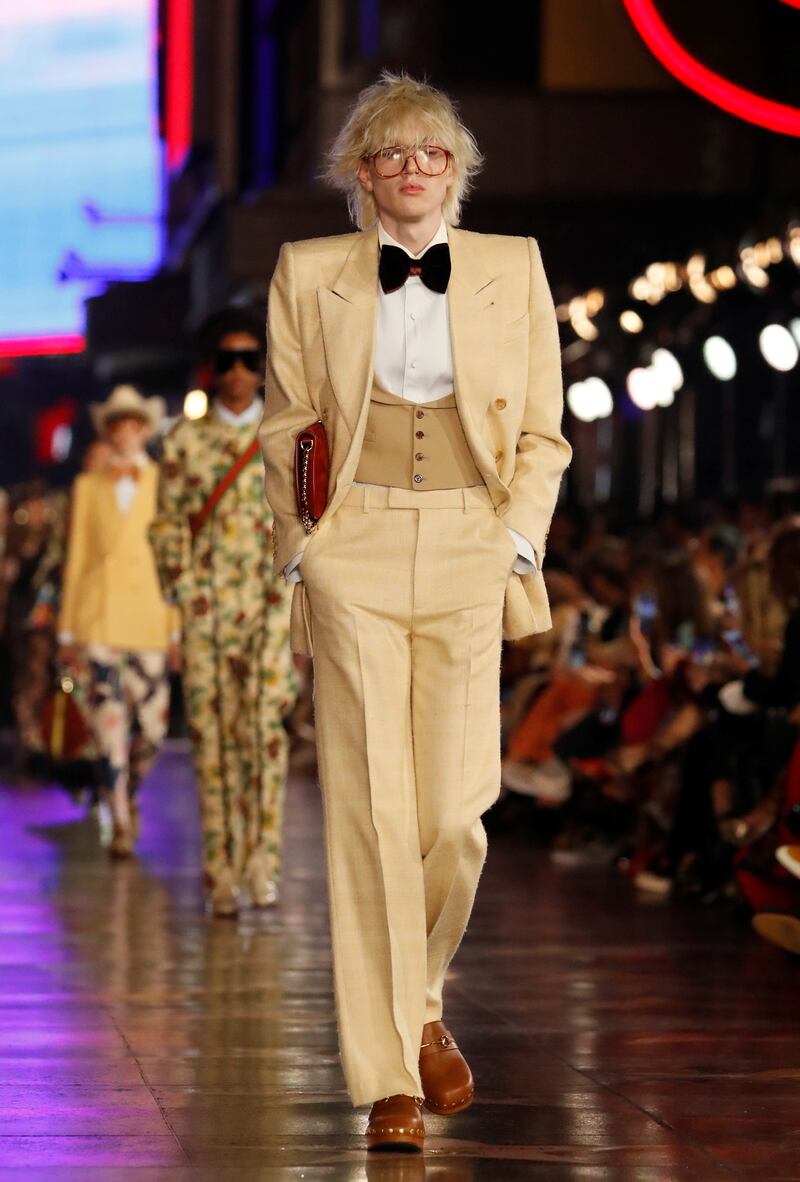 Old Hollywood glam mixed with retro suits. Reuters