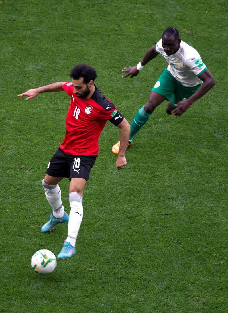 Mohamed Salah, left, saw Egypt's World Cup 2022 hopes dashed by Senegal. AP