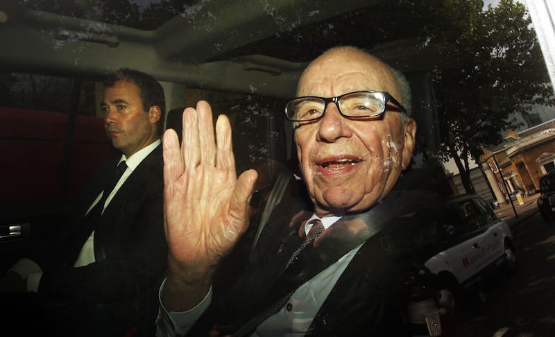 Rupert Murdoch leaving the headquarters of News International in Wapping, east London, in 2011. PA