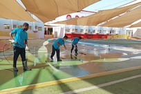 Teachers and staff team up to get Dubai's private schools open after historic rain 