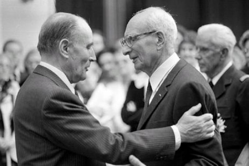 Claude Lévi-Strauss is awarded the Commander of the National Order of Merit by French President Francois Mitterrand on June 19, 1985 in Paris.