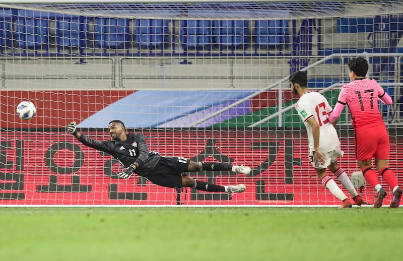 UAE goalkeeper Khalid Eisa makes a save. EPA