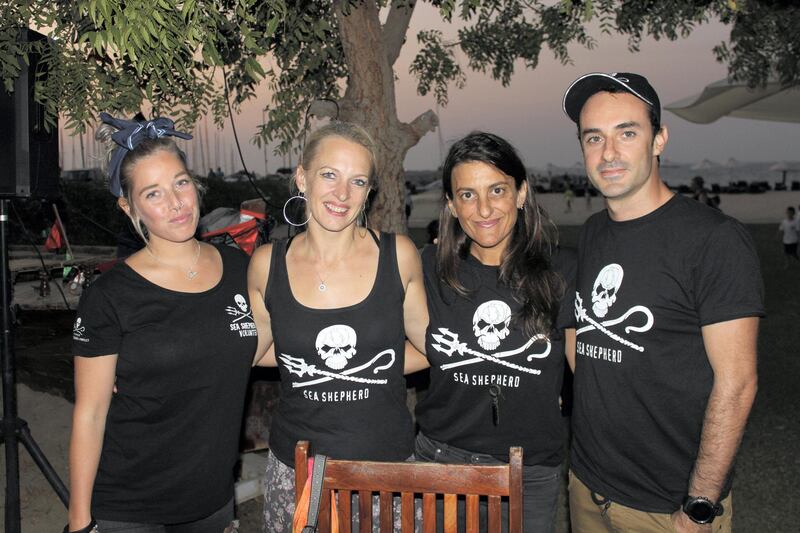 Sea Shepherd UAE volunteers with managing director Natalie Banks (second left) celebrate the official launch of the not-for-profit conservation group, at Dubai Offshore Sailing Club. Credit Malcolm Feren