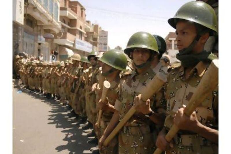 Ali Abdullah Saleh's return to Yemen has sparked fresh protests, which the army prepared to face in Sanaa yesterday. Mohamed Al Sayaghi / Reuters