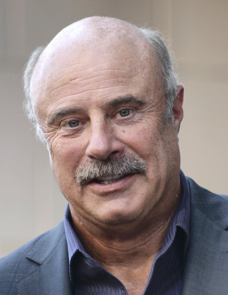 Dr. Phil McGraw attends the star unveiling ceremony for actor and radio host Steve Harvey in Hollywood, California, on May 13, 2013.  Harvey received the 2,497th star on Hollywood Walk of Fame in the Category of Radio.  AFP PHOTO / ROBYN BECK (Photo by ROBYN BECK / AFP)