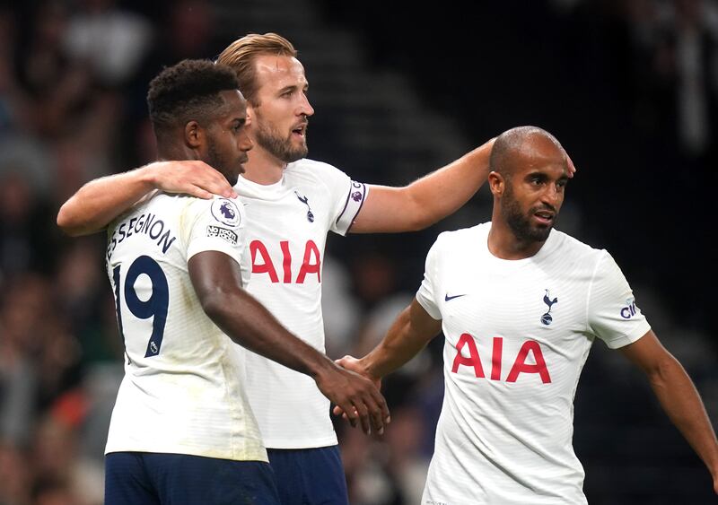 Harry Kane celebrates with Ryan Sessegnon and Lucas Moura after scoring for Tottenham against Pacos de Ferreira in the Europa Conference League play-offs second leg.