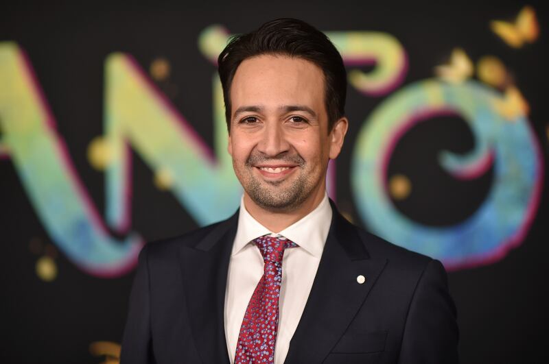 Performer and advocate Lin-Manuel Miranda joins a star-studded voter campaign with former US first lady Michelle Obama. AP