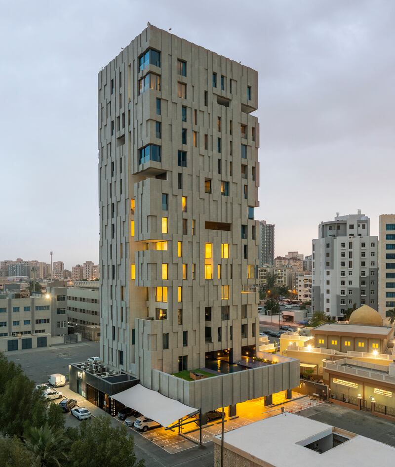 Wafra Wind Tower, Kuwait City, Kuwait, is a 13-storey building conceived as a wind tower featuring a central, vertical courtyard that provides natural ventilation to each apartment unit.