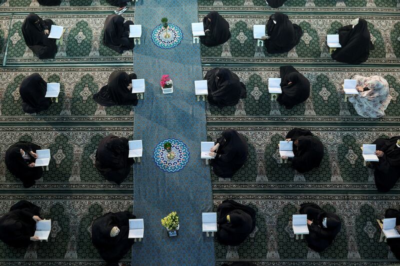 Iranian women read the Quran at the shrine of Shah Abdol-Azim in Tehran. Reuters
