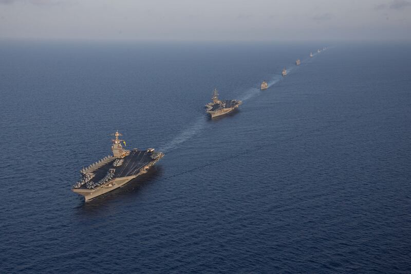Aircraft carriers Gerald R Ford, left, and Dwight D Eisenhower sail in formation in the Mediterranean Sea. DoD / AFP