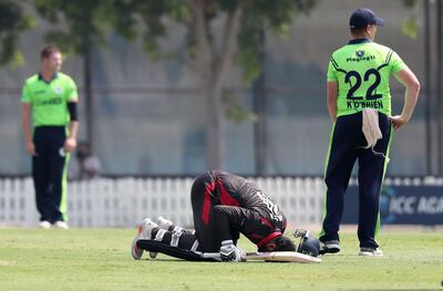 Mohammad Waseem of UAE prays after scoring his century against Ireland. Pawan Singh / The National. 