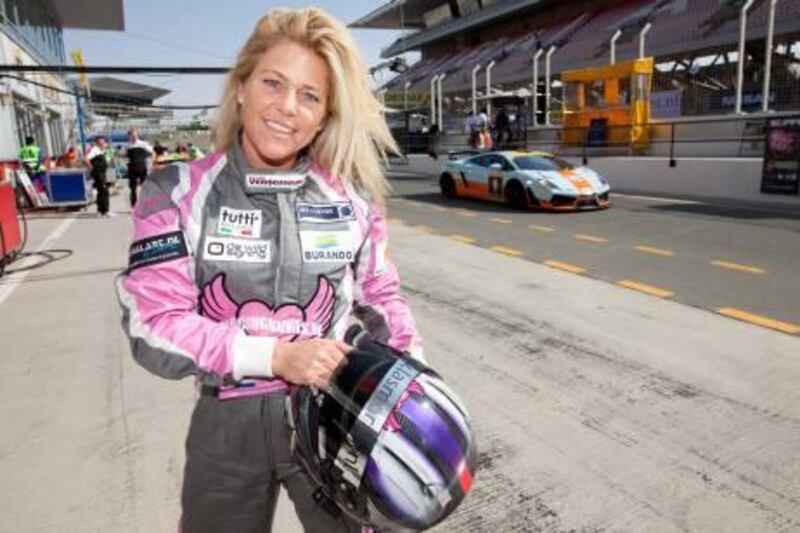UAE - Dubai - Jan 12 - 2012: Liesette Braams, driver of the Racing Divas, pose for a portrait at Dubai Autodrome. ( Jaime Puebla - The National Newspaper )