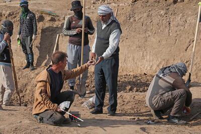 Archaeologists and workers excavate the ancient Sumerian city of Girsu, known as Tello. AFP