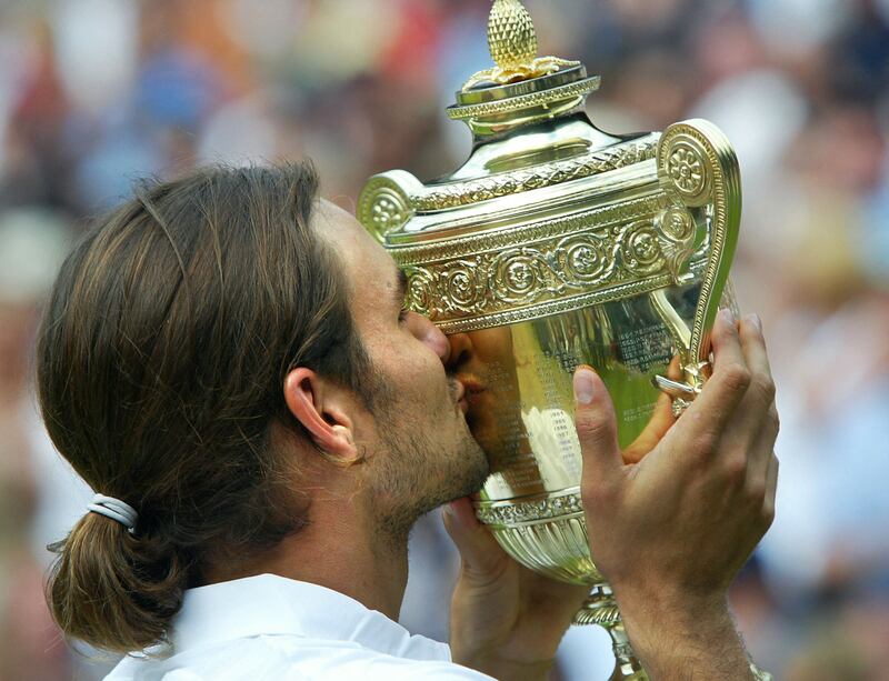Roger Federer won his first major title at 2003 Wimbledon, defeating Mark Philippoussis in the final. AFP