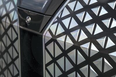 The impressive grille, but electric cars don't actually need them, hence it is sealed