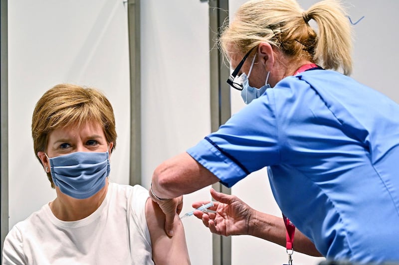 First Minister of Scotland Nicola Sturgeon receives her second dose of the AstraZeneca vaccine at the NHS Louisa Jordan vaccine centre in Glasgow. AP Photo