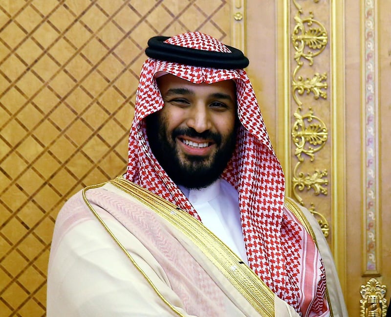 FILE - In this July, 23, 2017 file photo, Saudi Crown Prince Mohammed bin Salman poses while meeting with Turkey's President Recep Tayyip Erdogan in Jiddah, Saudi Arabia. Saudi Arabia announced on Monday, Dec. 11, 2017 it will allow movie theaters to open in the conservative kingdom next year, for the first time in more than 35 years, in the latest social push by the countryâ€™s young crown prince. (Presidency Press Service/Pool Photo via AP, File)