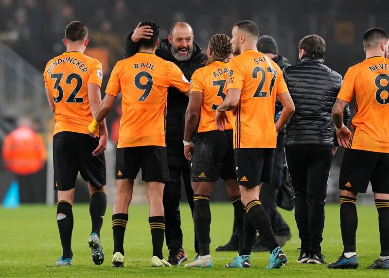 Wolves manager Nuno Espirito Santo celebrates with his players after the match. Reuters