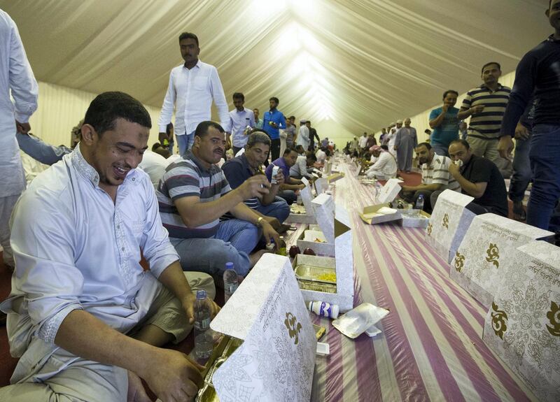 ABU DHABI, UNITED ARAB EMIRATES, 17 May 2018 -Muslims breaking their fast at Sheikh Zayed Grand Mosque, Abu Dhabi. Leslie Pableo for The National